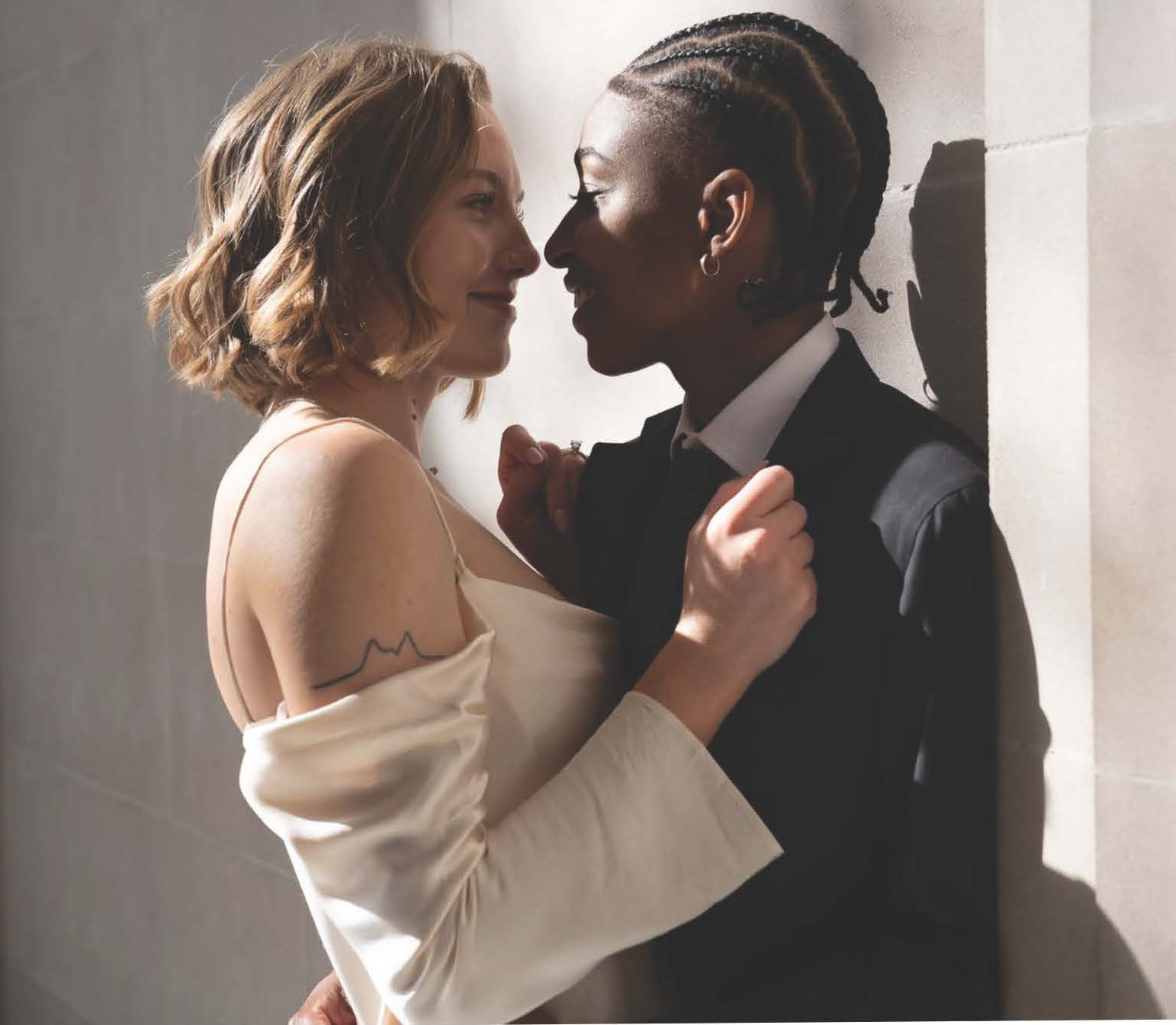 Gabby and Amelia sharing an embrace